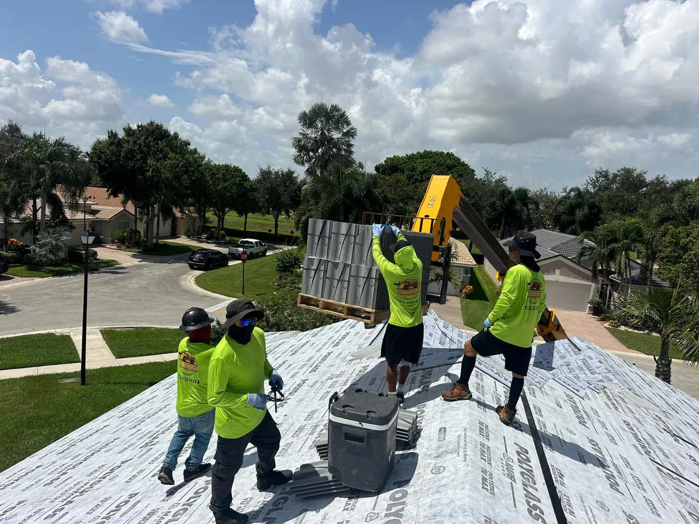 MMJ telehandler and pallets prepared for roof tile loading